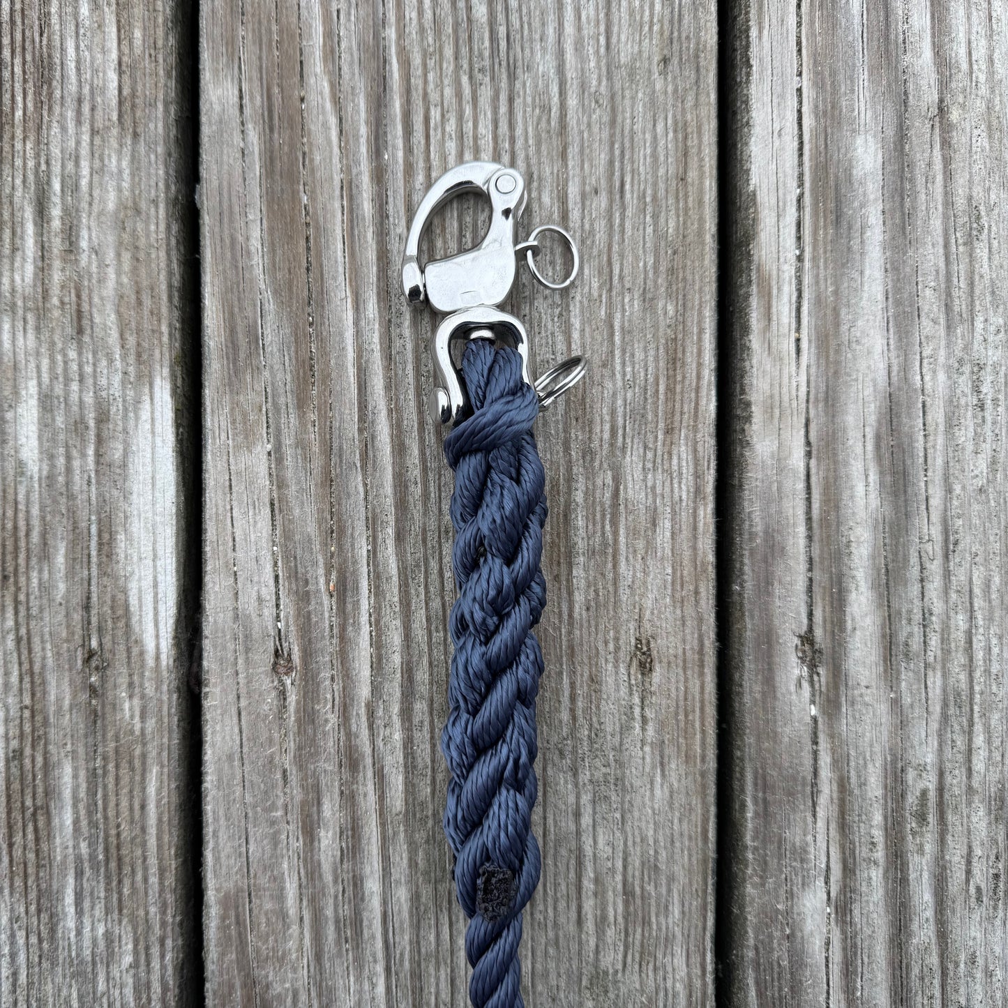 Woofport Dock Line Lead close-up of 316 stainless snap shackle and hand-spliced rope