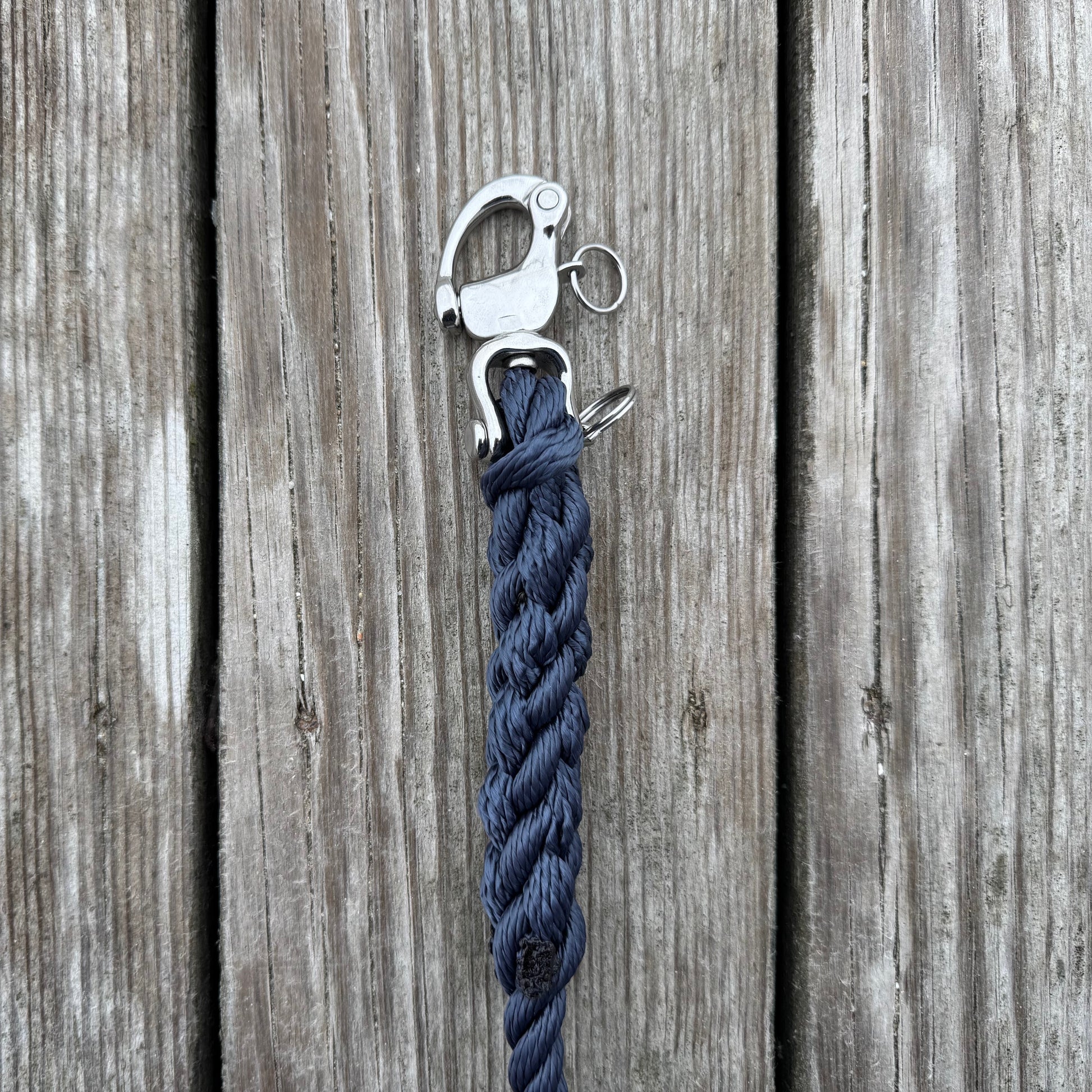 Woofport Dock Line Lead close-up of 316 stainless snap shackle and hand-spliced rope